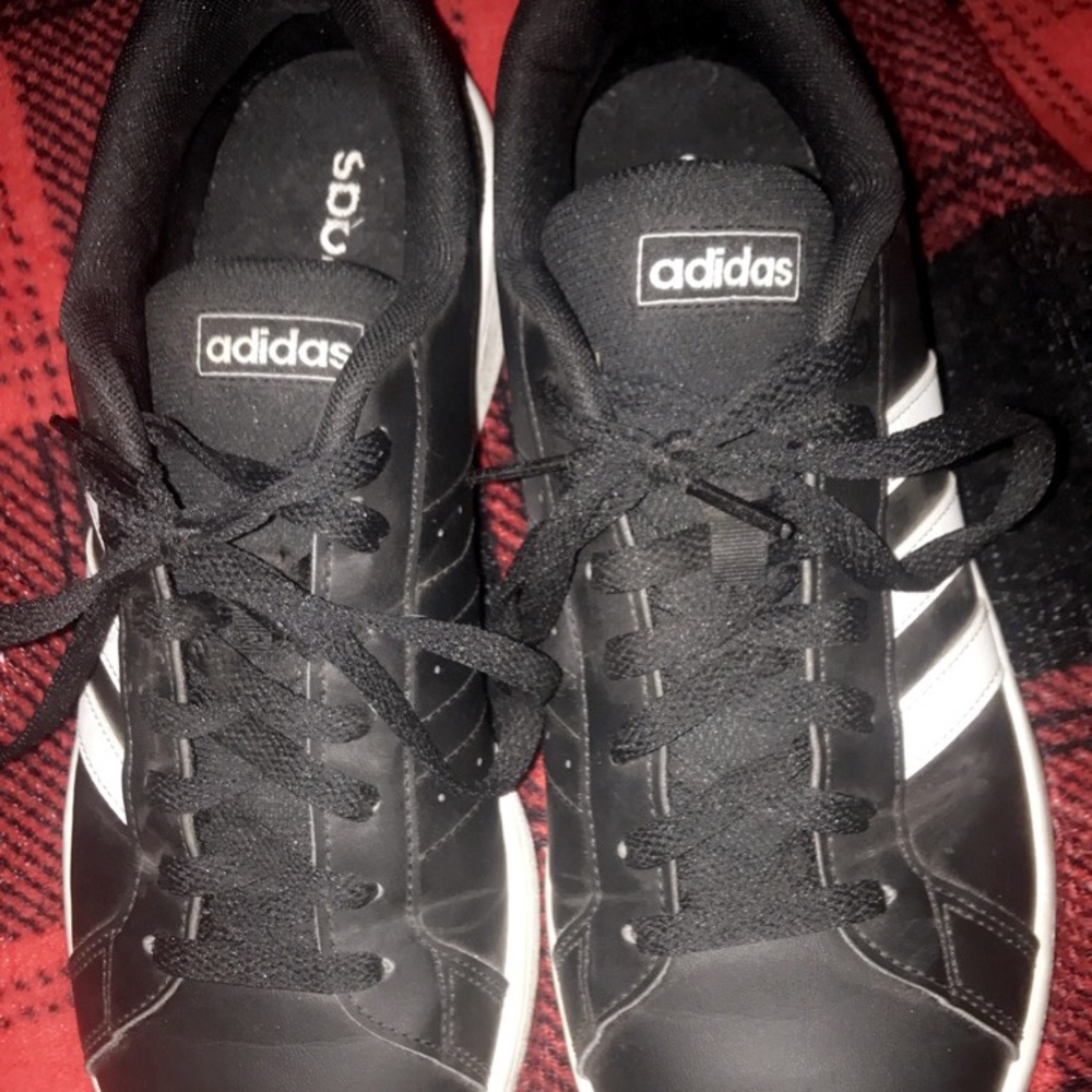 black Adidas shoes, size 9